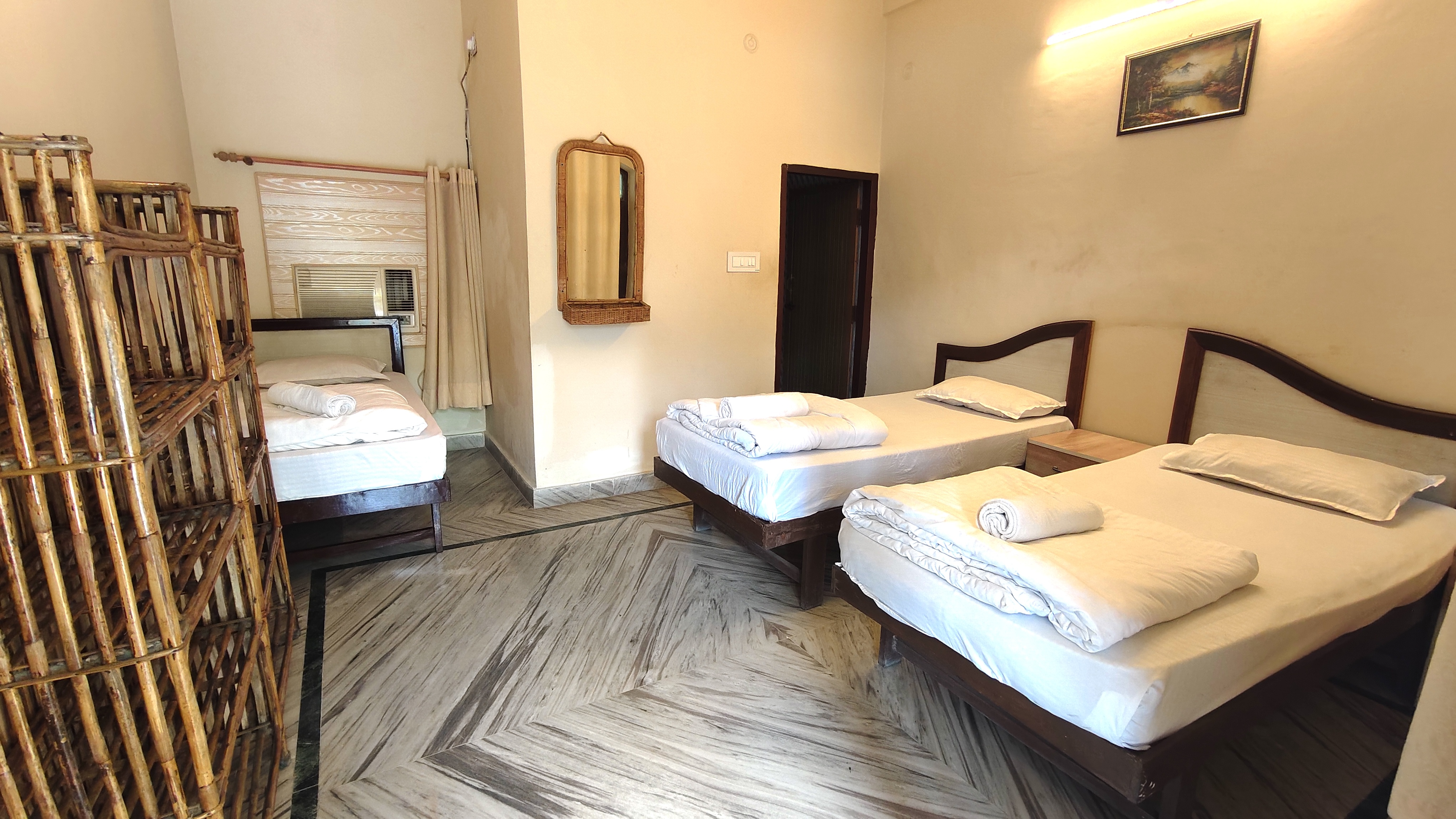 Triple sharing room — Rishikesh Sadan